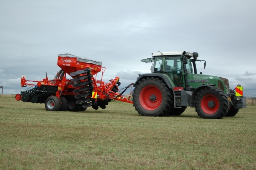 Kuhn SD4000 following a Fendt tractor